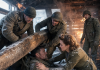 “Lift the beam or he dies right now!” I screamed as fire consumed the cabin. I was just a prisoner, but watching the scarred sergeant pinned under heavy timber while a beautiful nurse wept for his life made me choose humanity over my only chance at freedom.