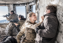 “Drop your weapons, American!”—that was the exact second my 73-hour frozen nightmare on an 8,400-foot peak turned into a bloody, close-quarters execution. Trapped in a ruined weather station with a massive scar tearing across my throat and an enemy blade at my skin, my team and I had to fight for every breath against twelve elite hunters. Did we survive? Read on to find out.