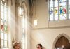 Sign the prenup now, Clara, or you’ll leave this cathedral in handcuffs!” Nathaniel screamed while his mother shoved the papers at my bruised shoulder. They thought tearing my dress would break me, completely unaware that 100 armed royal knights were currently breaking down the oak doors to bankrupt his empire