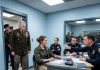 The cops laughed at my ID and cuffed me for “impersonating” a SEAL. They had no idea who I really worked for until the General walked in, looked at my gear, and told them the terrifying truth about why I was truly there that night.
