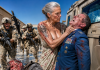 “Take your hands off that weapon, Colonel, or I’ll open your throat right here.” They thought I was just a frail, 60-year-old grandmother baking pies for my grandson’s Marine graduation, until they saw the massive combat scar on my shoulder and realized exactly whose blood shattered the sniper scope in the watchtower.
