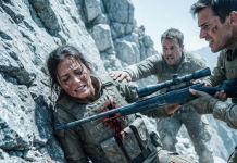 “This piece of lumber is slowing us down!” The Captain hissed, shoving my heavy sniper rifle into my open, painful wound before abandoning me on a death-ledge. He thought my career was finished, but he forgot I could read the high-altitude wind—and my next 11 shots would trigger a dark military investigation.