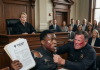 “Look at my face, Judge Collins, this scar is real, and so is your corruption!” I roared before the flashbulbs blinded us. The beautiful judge panicked as my hands gripped the evidence. They thought a boy from the streets would break, until I pulled out a document that changed everything.