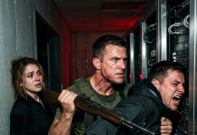 Don’t look at my scar, look at what she’s holding!” I screamed as the alarms blared. I thought I was just protecting a beautiful woman trapped in the red-lit server room, but the moment she reached behind her back, I realized the entire rescue was a setup to destroy me.