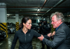 “Don’t touch that VIP limo, you’ll get us arrested!” my father screamed, violently grabbing my arm in front of the armed guards. He thought he was saving his “clueless” daughter from a federal crime, but his face turned pale when he saw what my key fob did to the entire fleet..