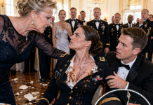 “You don’t belong at this table!” my mother-in-law hissed as she deliberately dumped her plate all over my Dress Blues. My husband grabbed my wrist under the table, forcing me to stay quiet. But when the General opened the secret folder on stage, the entire room gasped at what was inside…