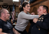 For 19 years, I hid from my past, believing I failed my unit. When I finally walked into our reunion, a loudmouth coordinator publicly humiliated me, claiming I never belonged there. I was ready to walk away forever, until a double-amputee veteran suddenly recognized my face. What he revealed left everyone entirely speechless…