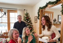 While I Was Holding the Christmas Cake, I Heard My Mother Say, “Don’t Ask Her. Your Sister Can Have Her Apartment for Free.” I Froze Behind the Door—Then Walked In, Smiled, and Ate Christmas Dinner Like I Had Heard Nothing.