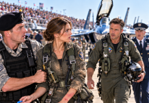 I Was Being Escorted Away From the Air Show in Front of 10,000 People When the Lead Pilot Suddenly Stopped His Jet—Then He Climbed Out, Walked Straight Toward Me, and Said Something About a Rescue Mission Nine Years Earlier That Made the Entire Crowd Go Silent