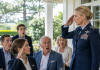 My father laughed over brunch at his country club while telling his golf buddies I was “just a nurse” handing out flu shots on some Air Force base. He thought I was too ordinary to matter, too quiet to impress anyone at his table. Then, twelve feet behind him, a two-star general slowly stood up, stared directly at the insignia pinned to my blazer, and addressed me by the title my father never imagined I carried.