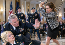 I Had Just Received a Purple Heart When My Stepmother Called Me a Fraud and Slammed a Metal Chair Into My Arm. I Fell Before Hundreds of Soldiers, While My Father Stayed Silent. Then General Reed Retrieved My Medal, Opened a Classified Folder, and Announced That My Family Knew Nothing About Me.