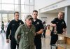 When a arrogant security guard decided to humiliate an elderly veteran in front of a packed room, he had no idea that a four-star general from his past was about to walk right through those doors to deliver the ultimate shock.