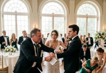 “Give me that vial before you destroy this family!” my father-in-law lunged, violently clawing at my groom’s arm to seize the poison while his wife lay convulsing behind us, completely unaware that I had already tapped into the estate’s hidden 4K security feeds.