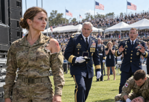 I Was Fixing Dead Speakers Before a Command Ceremony When a Colonel Grabbed Me, Tore the Patch From My Sleeve, and Mocked Me in Front of Two Thousand Soldiers—Then the Four-Star General Picked It Up, Looked at My Face, and Said the One Name Nobody Expected