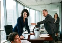 “You’re just a worthless cashier who got lucky, Jenny!” my brother spat from the floor, blood trickling from his torn collar. But as I leaned across the mahogany table watching security hold him back, he had no idea the fraud files scattered beneath him were about to drag our innocent father into a federal prison.