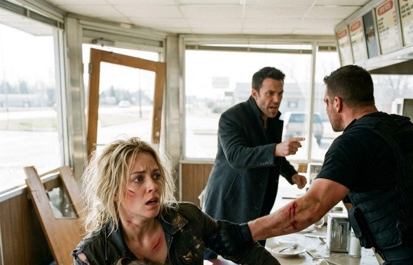 “Grab her, she belongs in an asylum!” Julian screamed as his mercenary gripped my bloody collar, but as I shielded my sobbing daughter on the diner floor, he had no idea the GPS tracker in her coat was already bringing an armed convoy straight to us.
